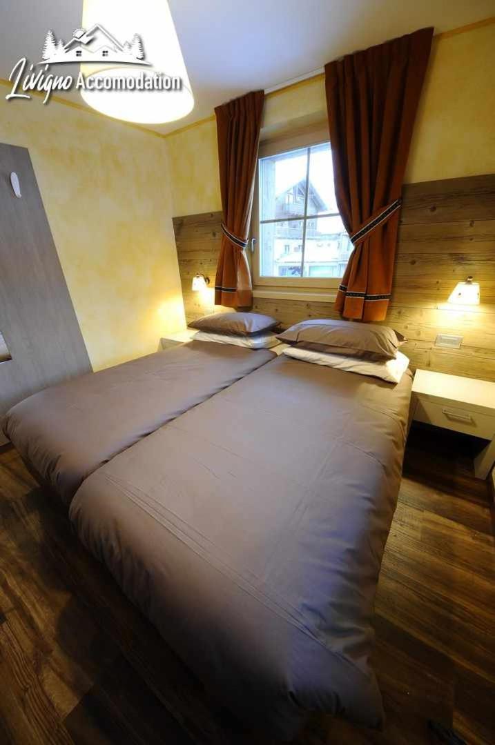 Alpen Flower By Livigno Accomodation Quarto foto