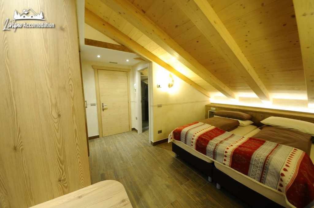 Alpen Flower By Livigno Accomodation Quarto foto